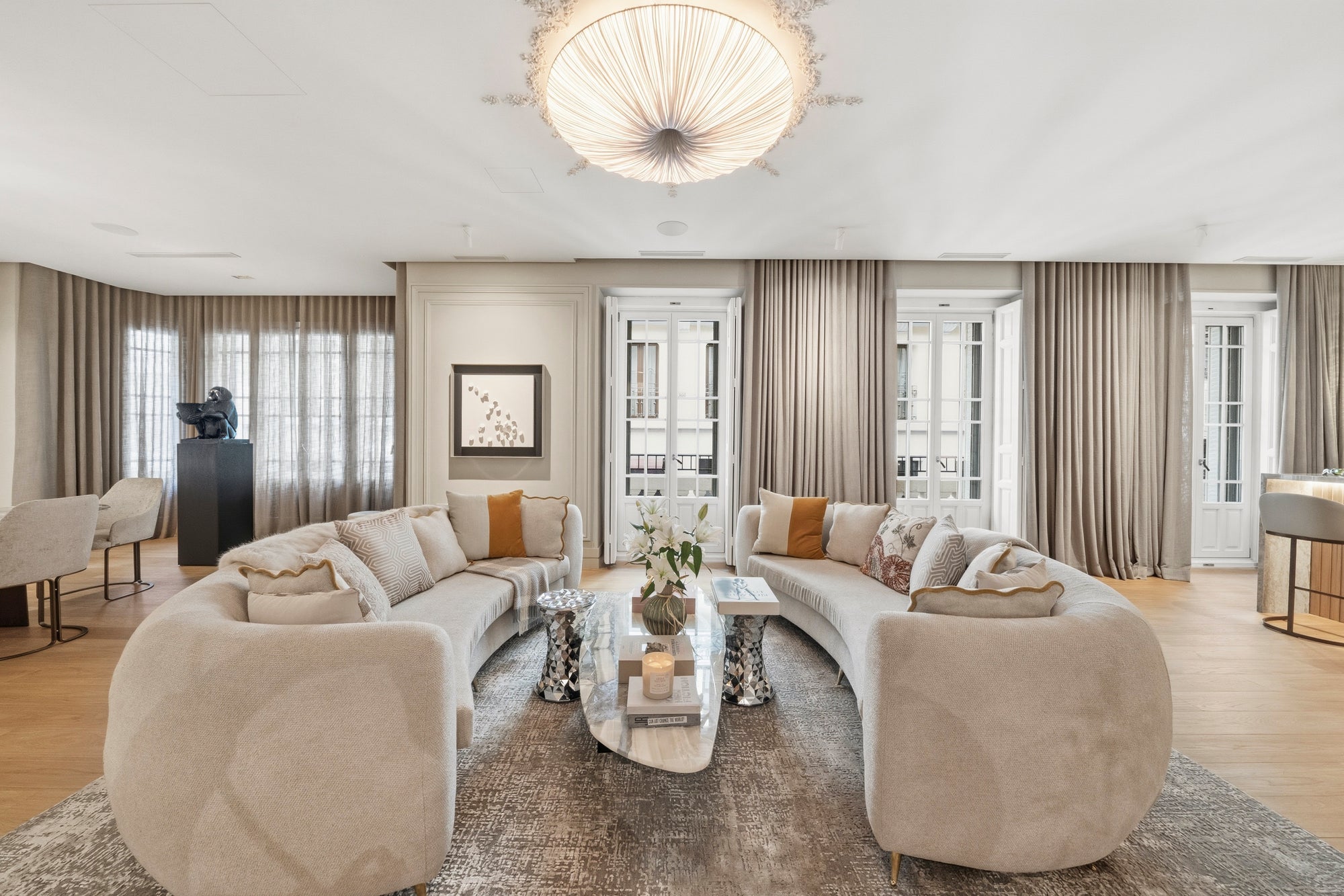 Curved salon in a contemporary villa, shot in natural light