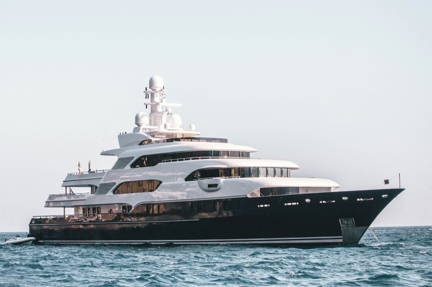Dark-hull superyacht profile at sea